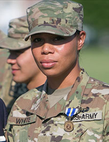 2nd Lt. Fesui White as a cadet receiving the Military Officers Association of America Award at the 1st Regiment Advanced Camp graduation in Fort Knox, Ky., June 29, 2019