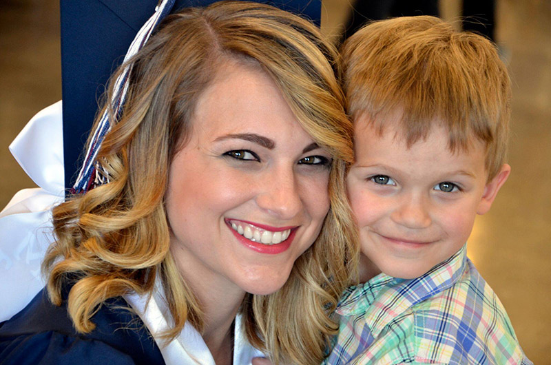  A&M-Central Texas graduate smiles with her son at commencement