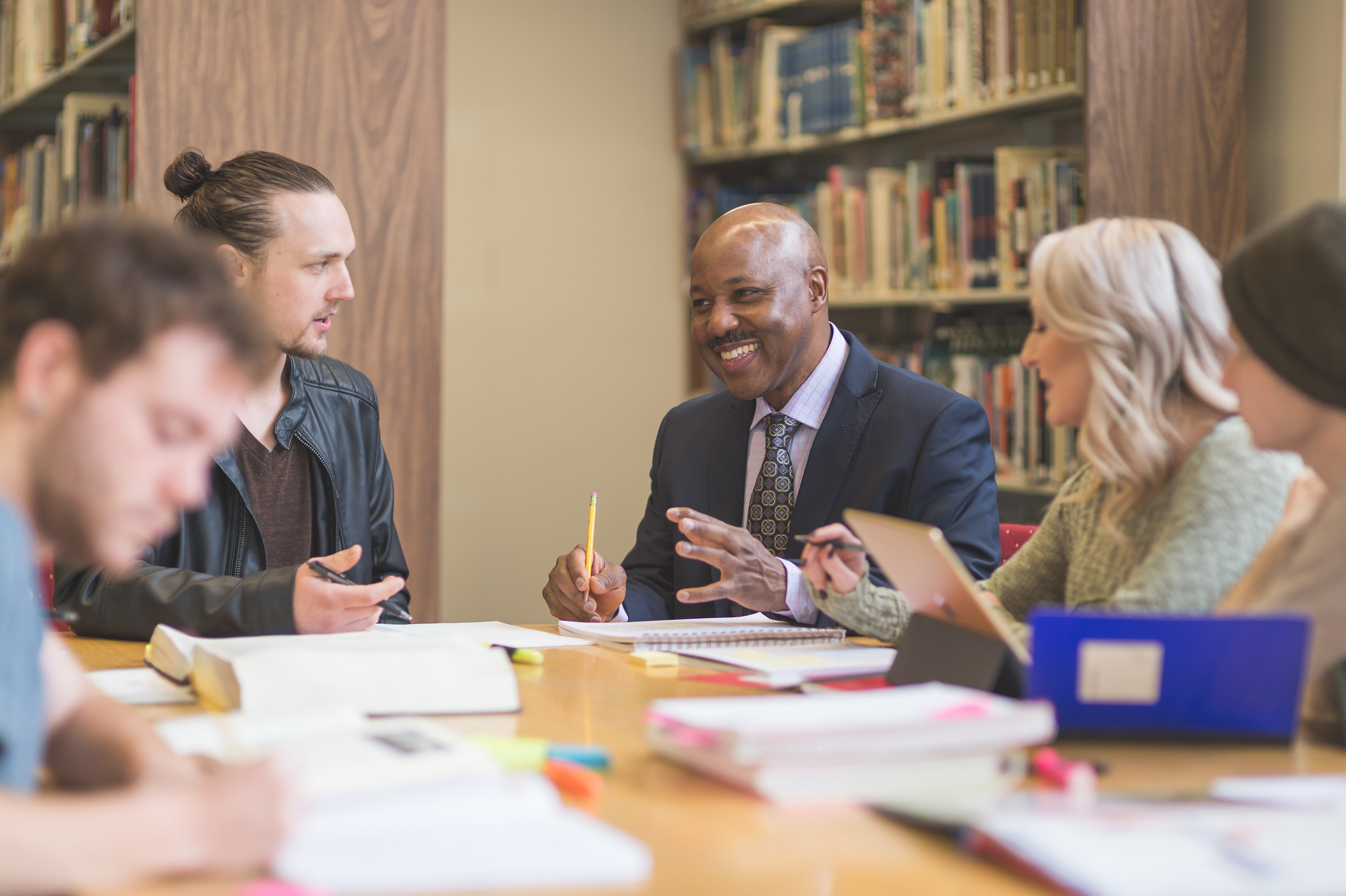 group of students discussing an assignment