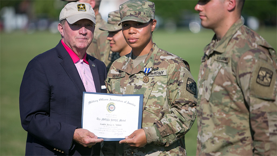 2nd Lt. Fesui White as a cadet receiving the Military Officers Association of America Award at the 1st Regiment Advanced Camp graduation in Fort Knox, Ky., June 29, 2019