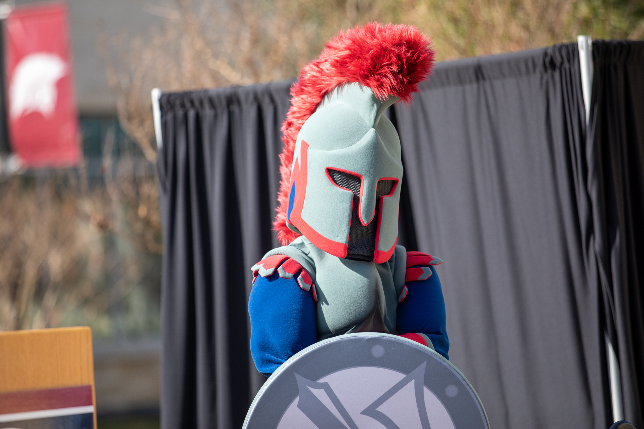 Pathfinder the warrior mascot standing on the stage.