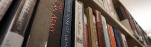 Many books on a library shelf