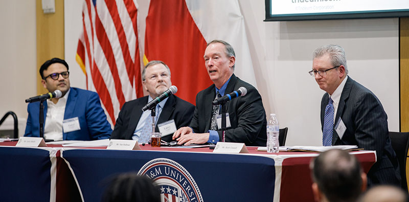 Trideum Corporation CEO Van Sullivan speaks to the audience as part of the afternoon discussion panel. Other panel members are: Centex Technologies President and CEO Abdul Subhani, Chairman of the Board of Tokyo Electron America, Inc., Larry Smith, and President and CEO of the Greater Killeen Chamber of Commerce Scott Connell.