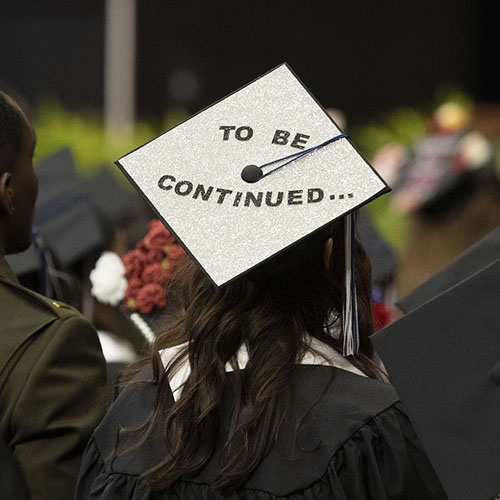 Graduation cap with to be continued on the back