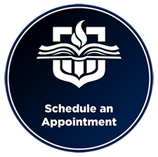 A circular, dark blue image with the TAMUCT crest and the words "Schedule an apppointment" below