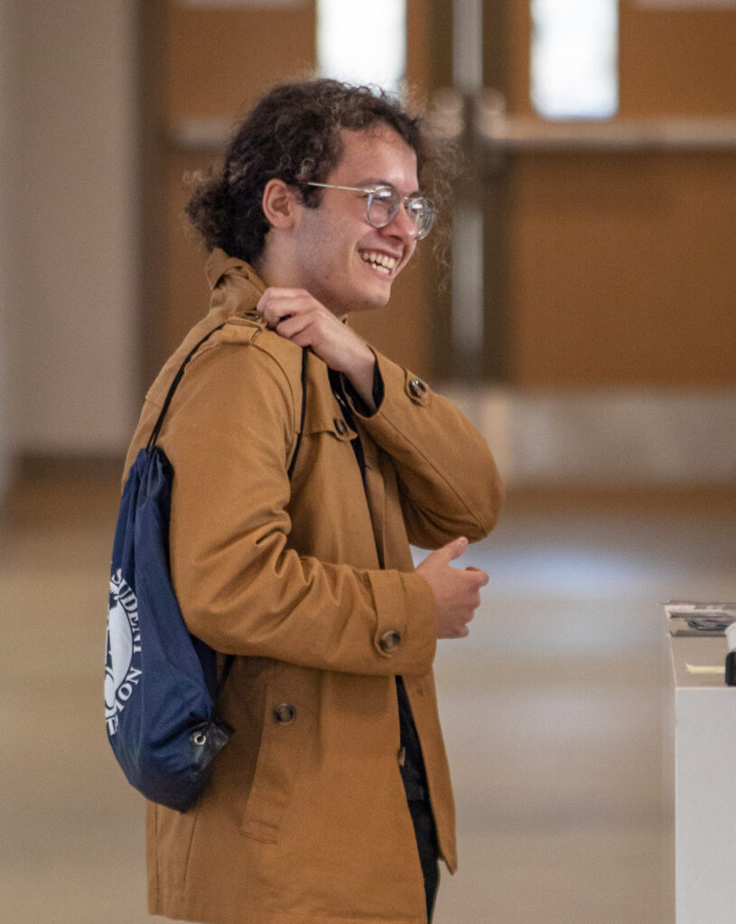 A student smiling