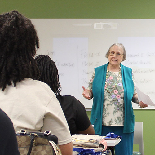Dr. Claudia Rappaport teaching a class