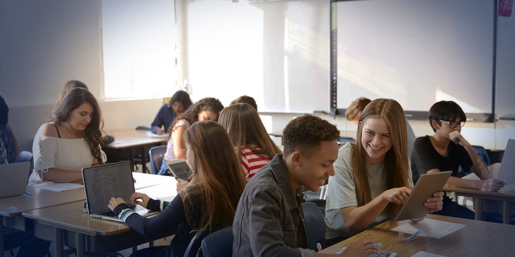 Students at desks working together