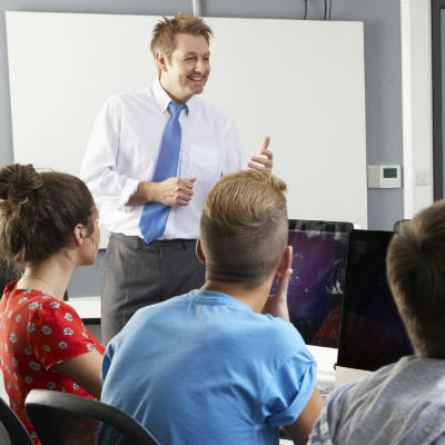 Man presenting at white board