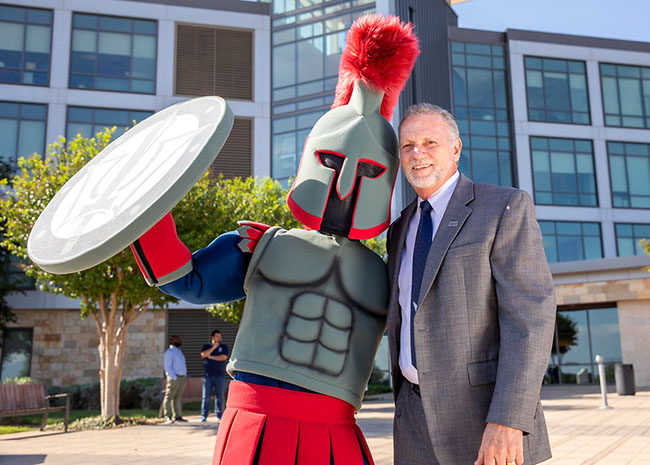 President Rhodes and TAMUCT mascot, Pathfinder