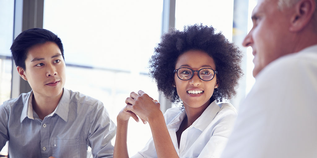 Three business professionals working together