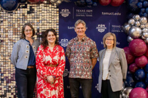 group photo of Dr. MK Long, Dr. Christine Jones, Dr. Peter Hershoc, and Dr. Nelly van Doorn-Harder