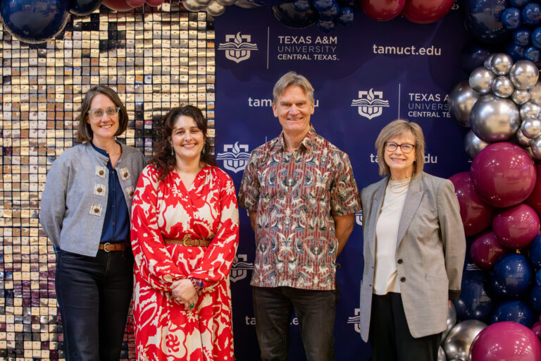 group photo of Dr. MK Long, Dr. Christine Jones, Dr. Peter Hershoc, and Dr. Nelly van Doorn-Harder