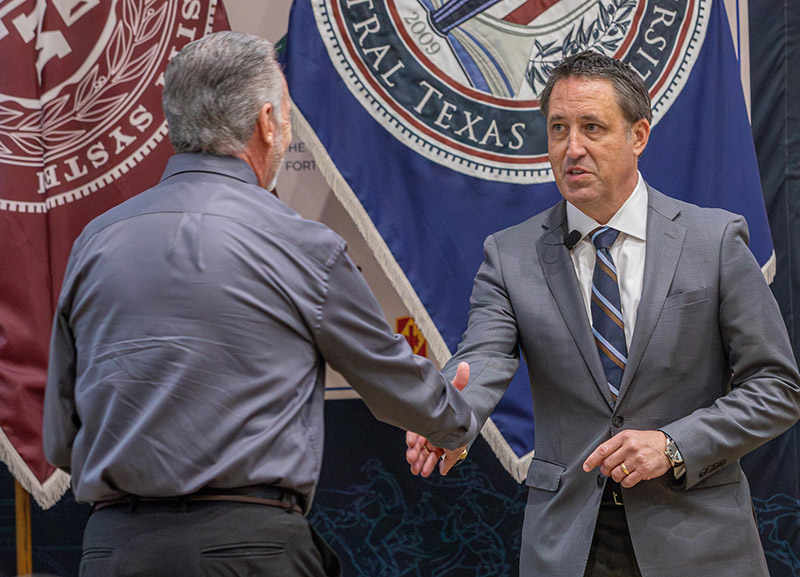 Image of University President Dr. Richard Rhodes and Chancellor Glenn Hegar.