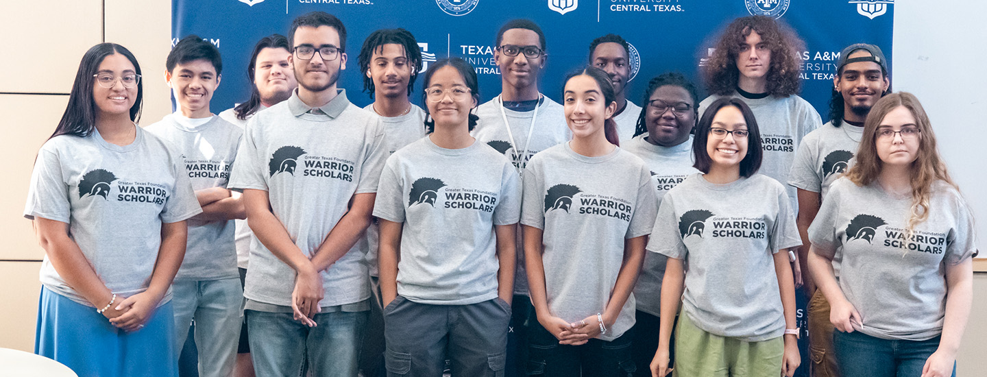 GTF Scholars group photo in matching gray T-shirts