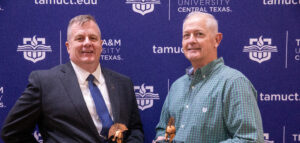 Greg Bourgeois (left) and Robert Wells received the Got Your 6 Award at the MVS banquet.