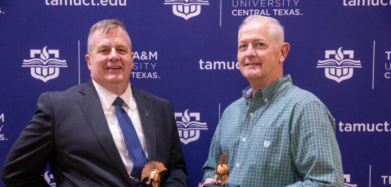 Greg Bourgeois (left) and Robert Wells received the Got Your 6 Award at the MVS banquet.