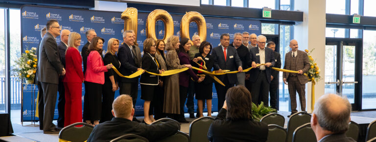 Temple College administrators and dignitaries cut the ribbon on a new building.