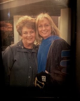 Andria Schwegler in her doctoral regalia.