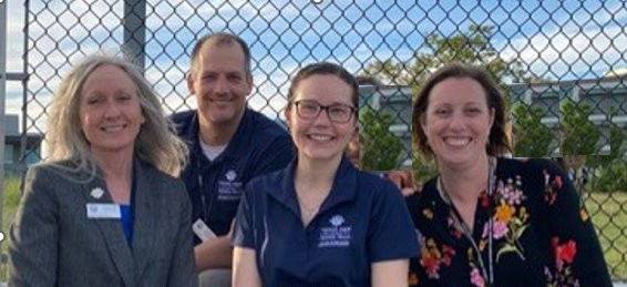 Andria Schwegler, left, with her psychology co-workers.