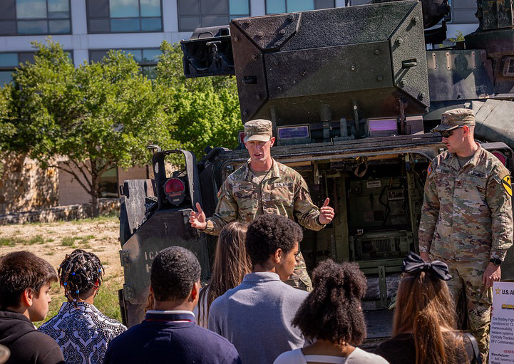 community event military group speaking to students