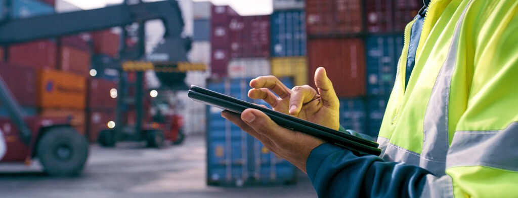 Hand, worker and tablet for shipping outdoor for cargo crane, inventory inspection and delivery safety of logistics. Person, digital and container information, transport service and distribution site