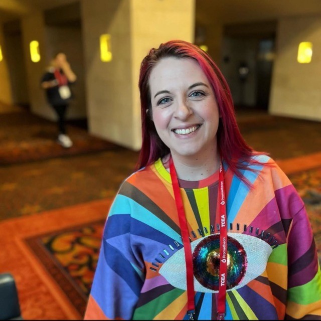 Woman in tie-dyed shirts.